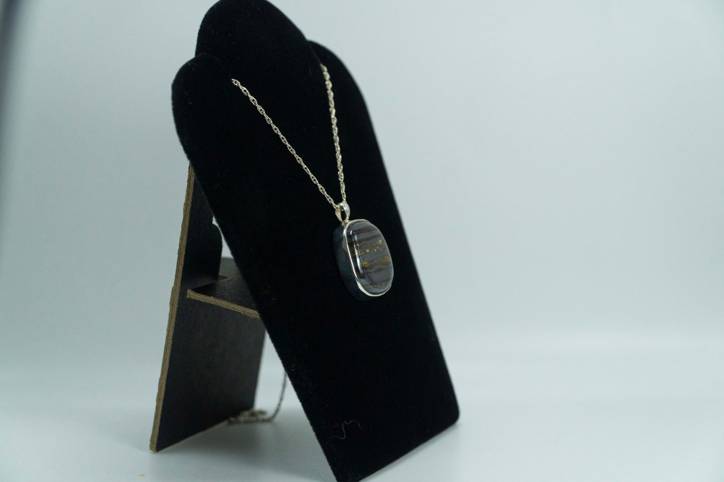 Tiger Iron Set In .925 Silver Pendant