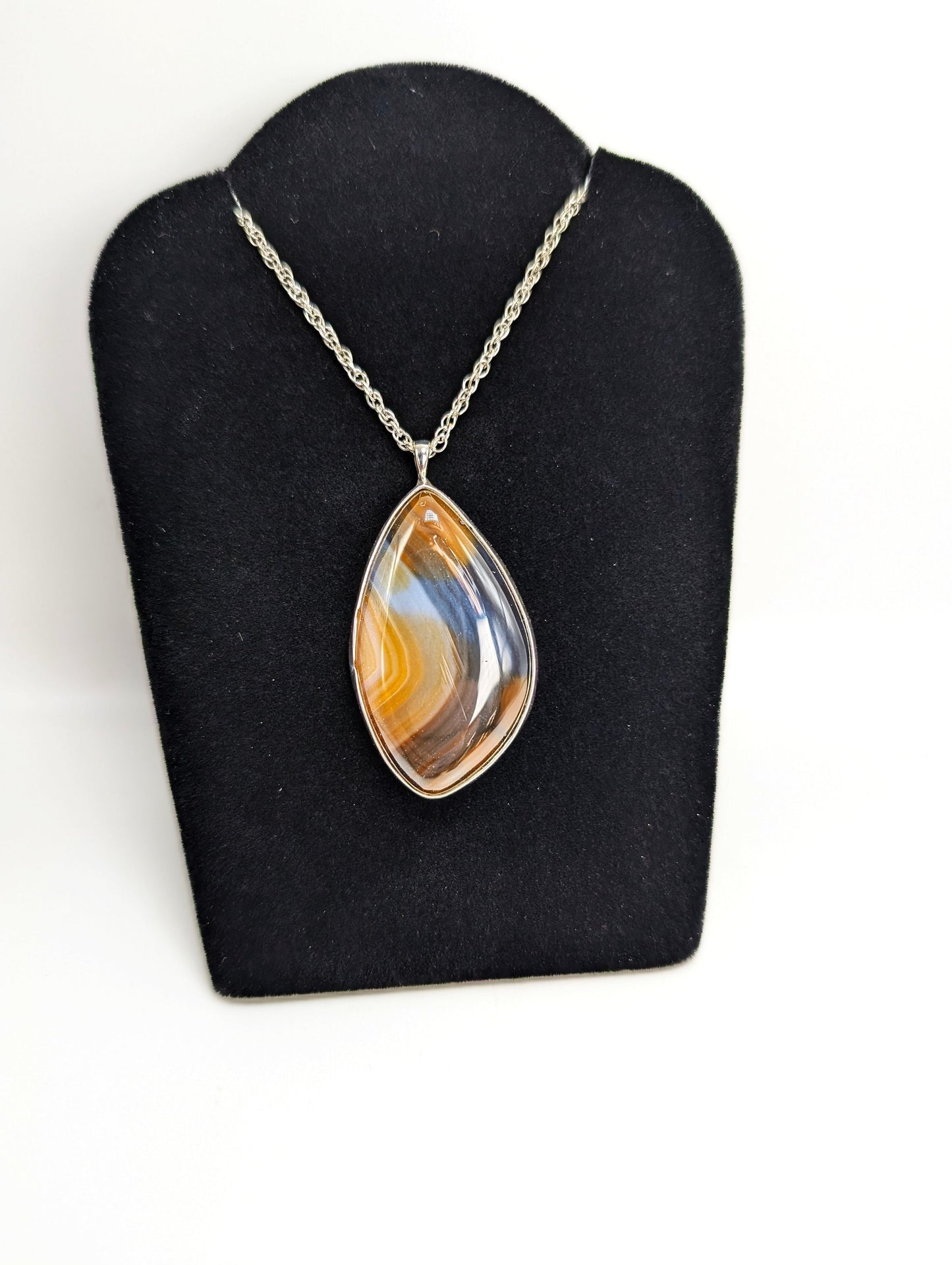 Banded Agate Set In Silver Pendant