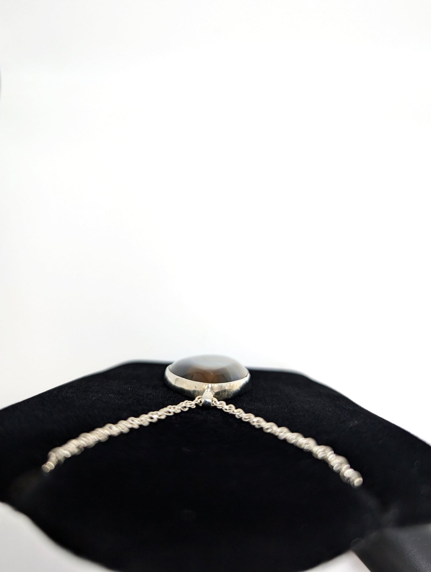 Banded Agate Set In Silver Pendant