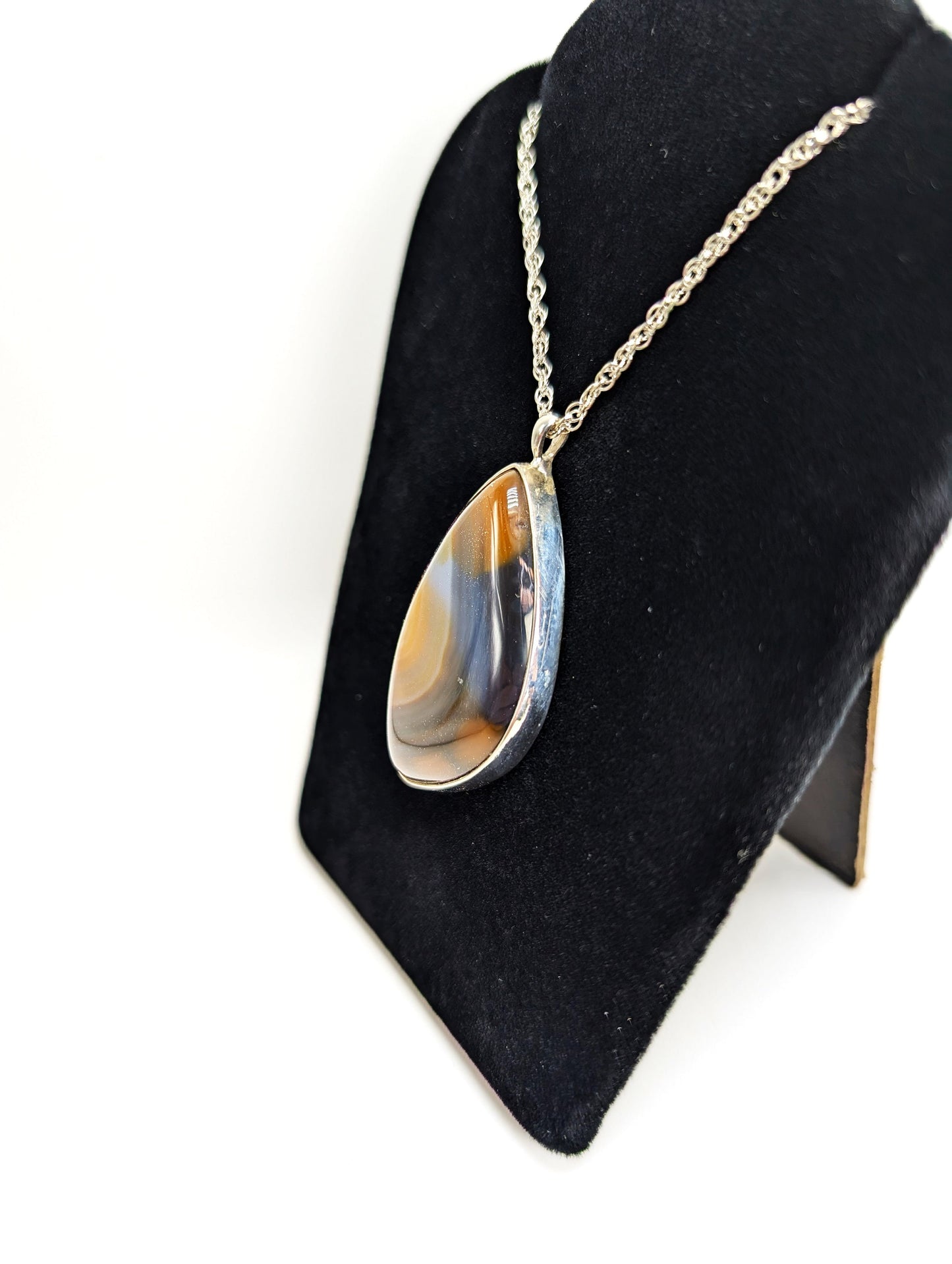 Banded Agate Set In Silver Pendant